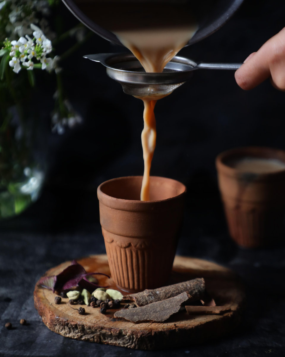 A warm cup of chai poured before an Arash Massage session in downtown Asheville